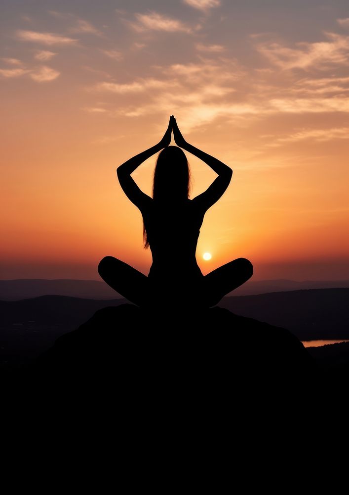 A woman silhouette doing yoga on the mountain in front of the moon adult sky spirituality.