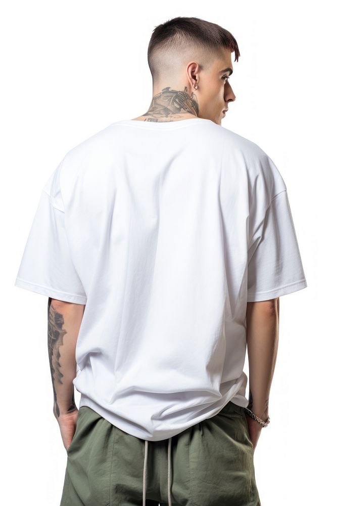 A man posting fashionable and wearing oversized white t-shirt back sleeve adult.