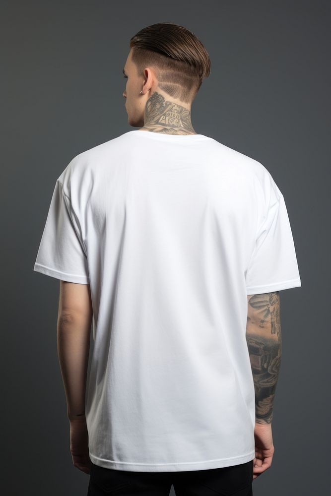 An oversized white t-shirt fashion sleeve tattoo.