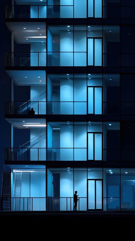 Large building wall night architecture lighting.