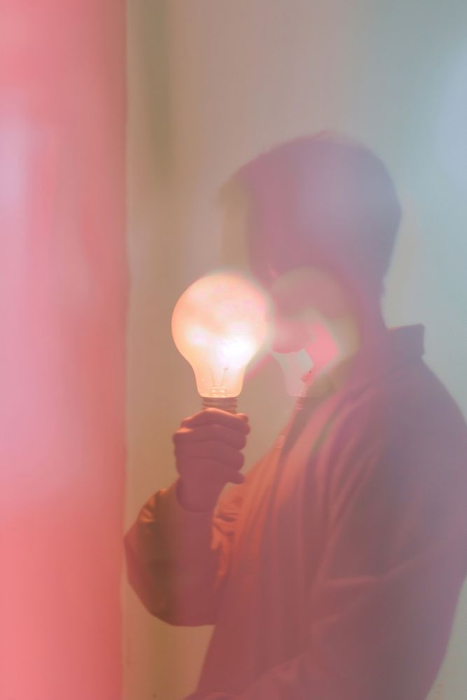 Person holding light bulb lighting | Premium Photo Illustration - rawpixel