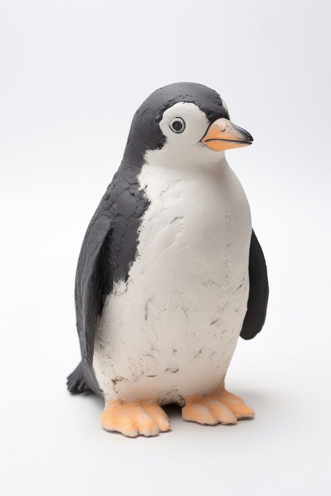 Penguin made up of clay animal bird white background.