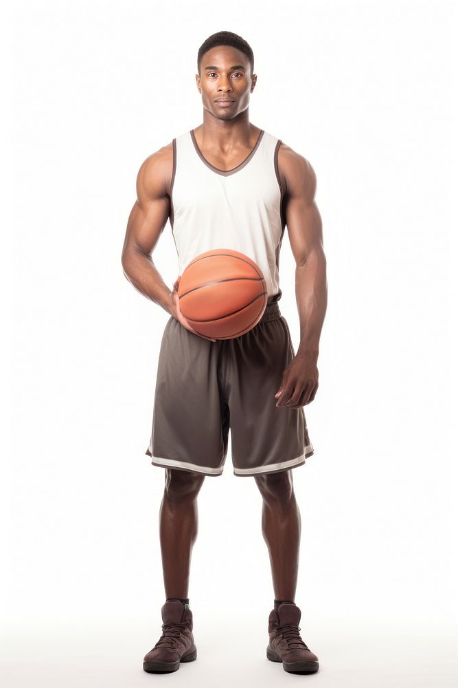 A basketball player standing confidently sports white background determination.