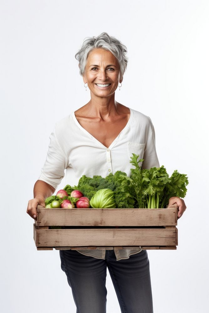 Mature Woman holding vegetable wodden box adult plant woman.