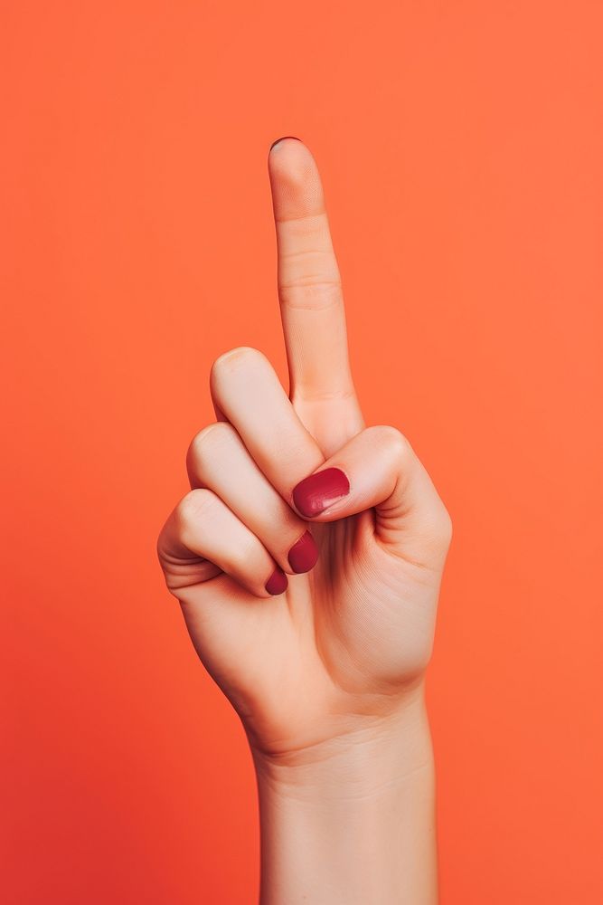 The finger of a woman displaying the okay sign adult hand fingernail.