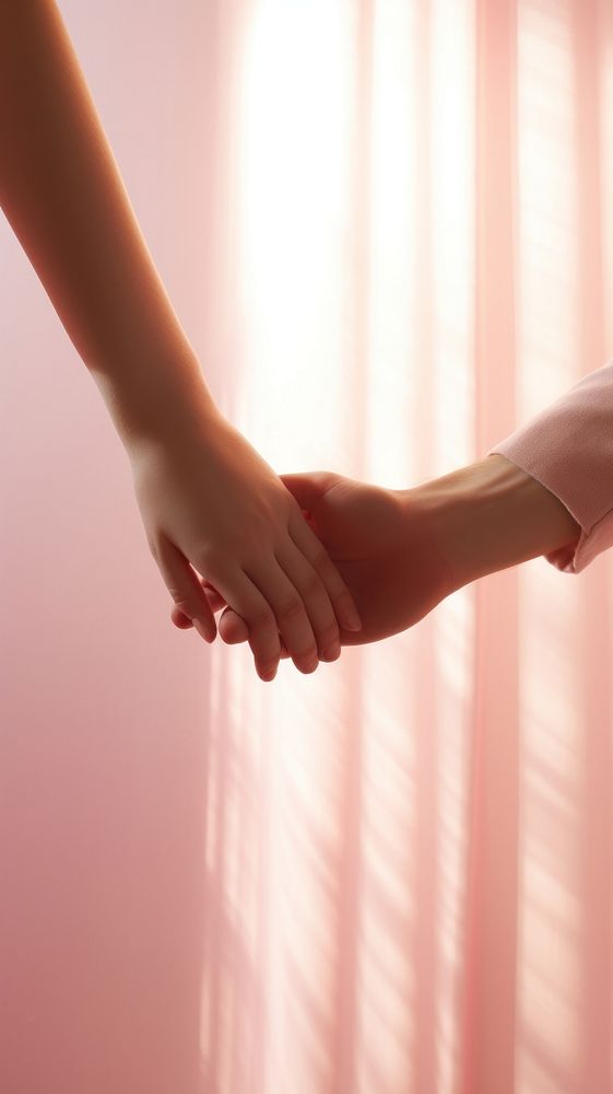 Hand of couple love holding together shadow pink togetherness.