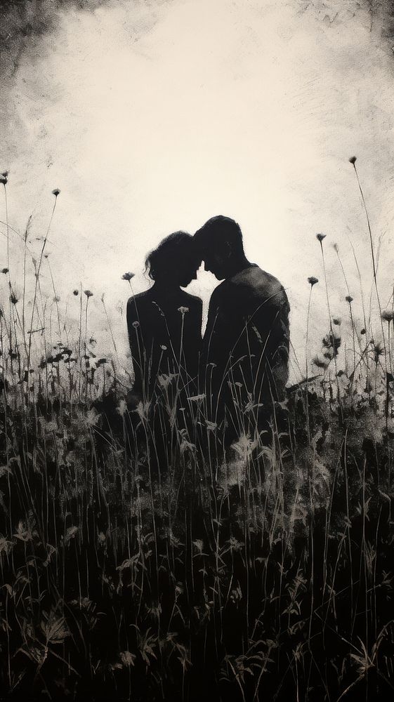 Couple love sitting in the meadow nature silhouette outdoors.