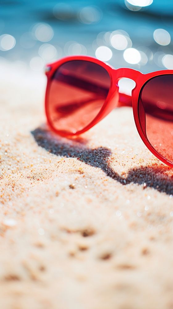 Red sunglasses summer beach day.