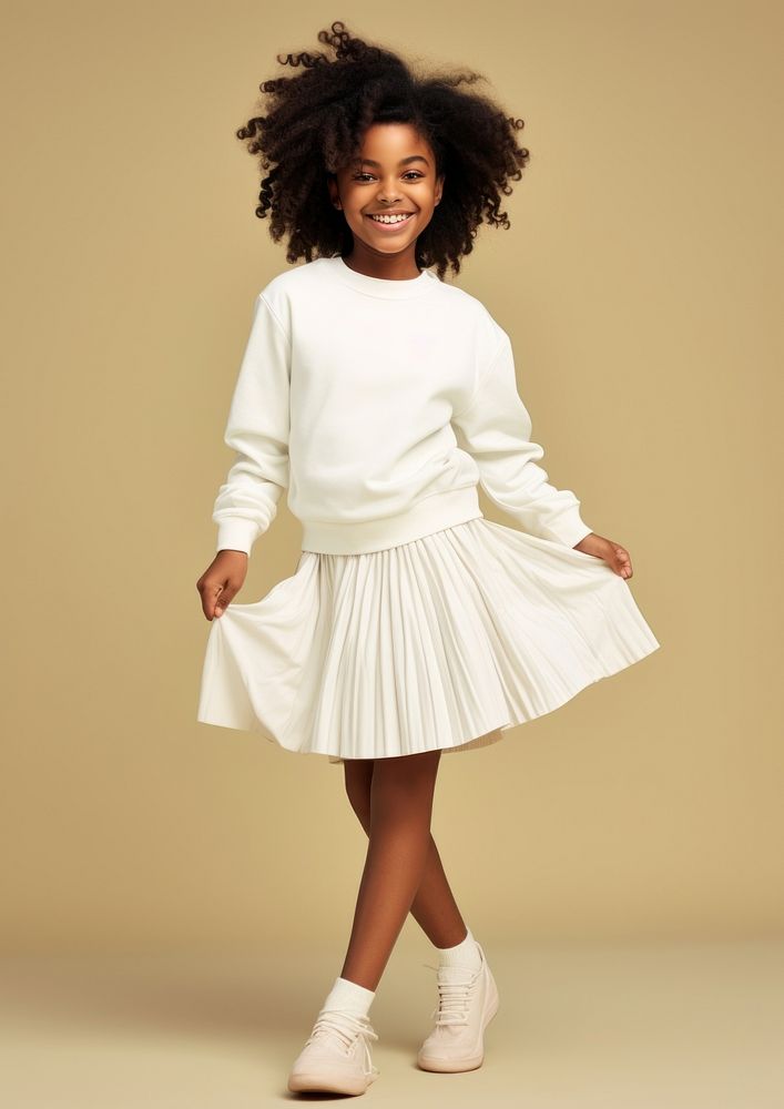 Cheerful black kid wearing blank white embroidered polo sweatshirt and white contrast pleated skirt miniskirt sleeve child.