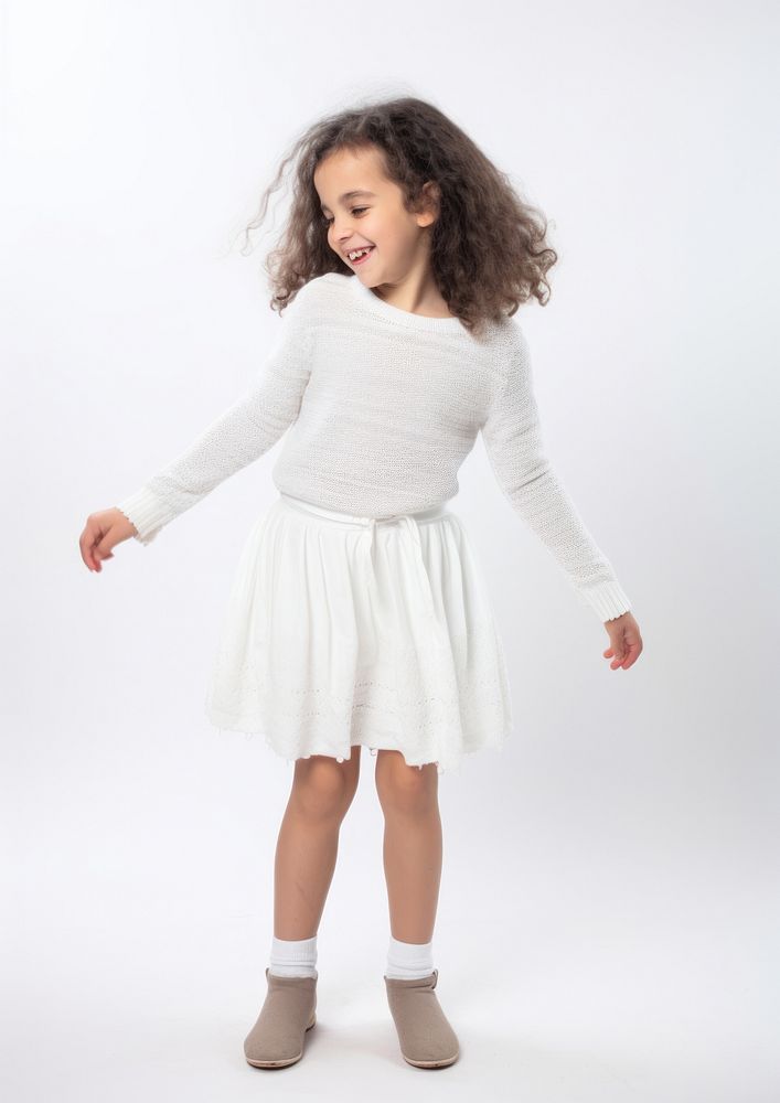Cheerful kid wearing white knit skirt miniskirt sleeve dress.