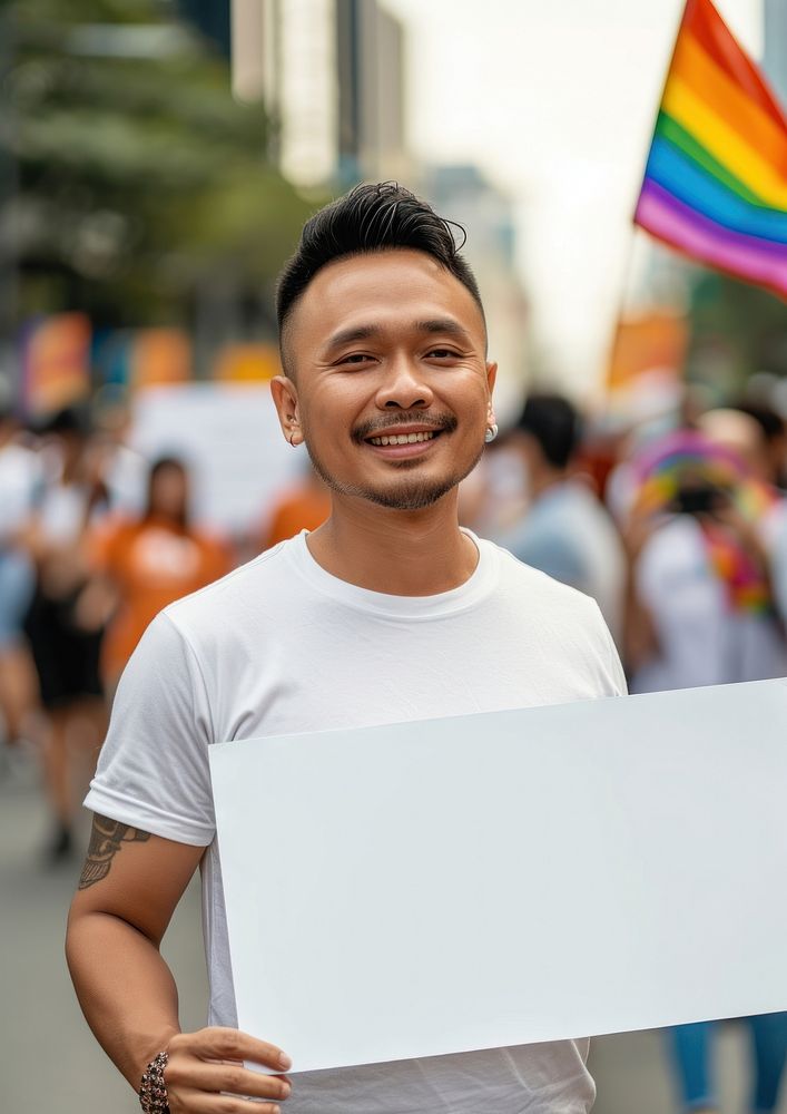 South east asian men standing smiling parade portrait holding.