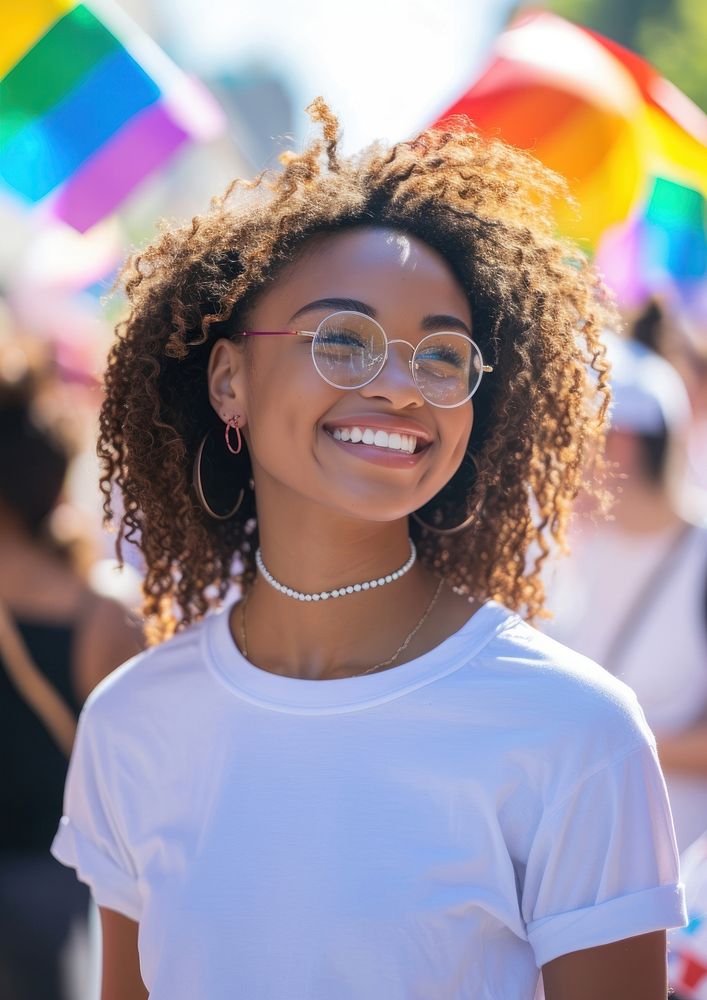 Black teen women standing smiling necklace portrait glasses.