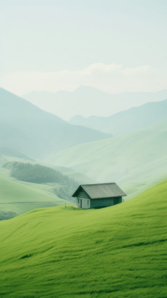 A cabin a green field with a valley architecture landscape grassland.