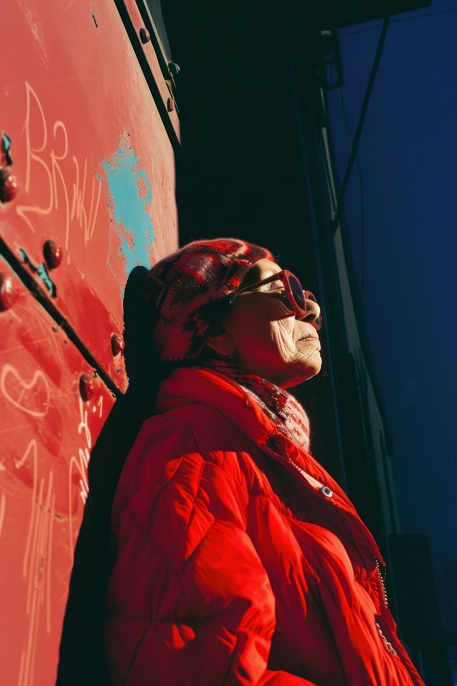 Old woman wearing red streetwear clothes portrait glasses adult.