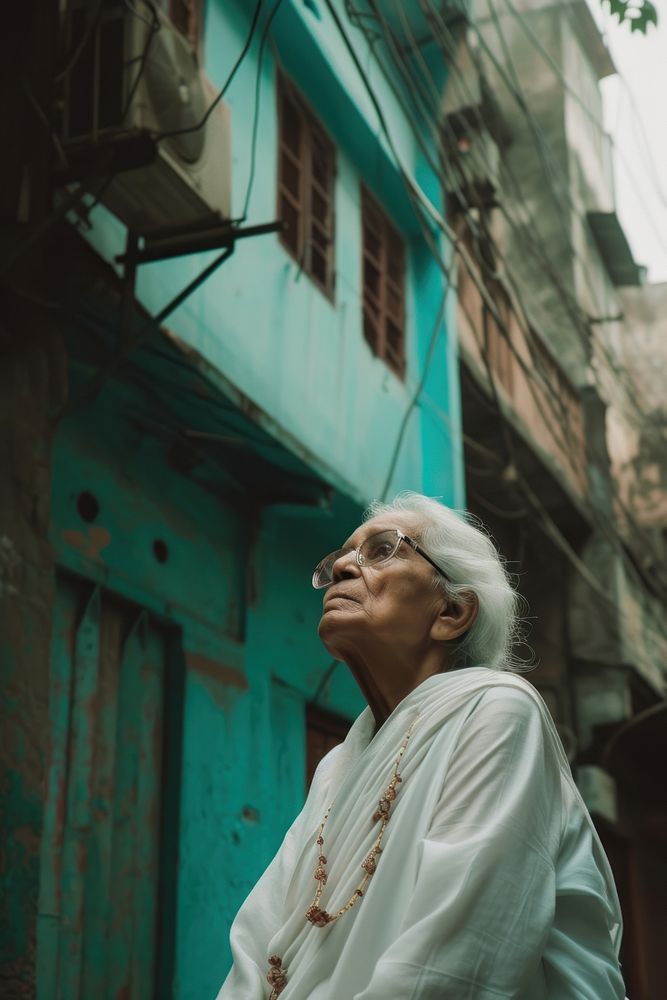 A old woman wearing white glasses street adult.