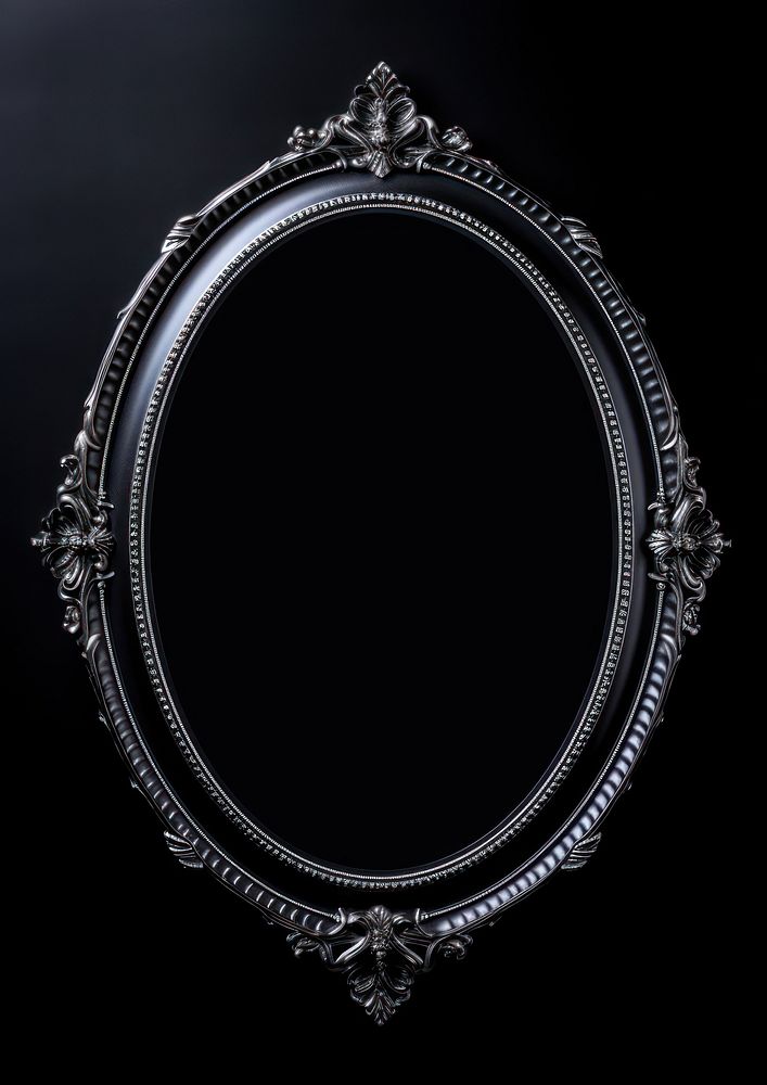 Ornamental black oval jewelry frame photo.