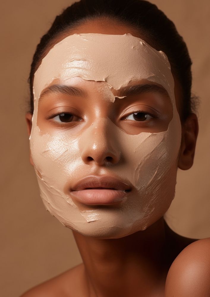 Woman applying facial mask skin portrait adult.