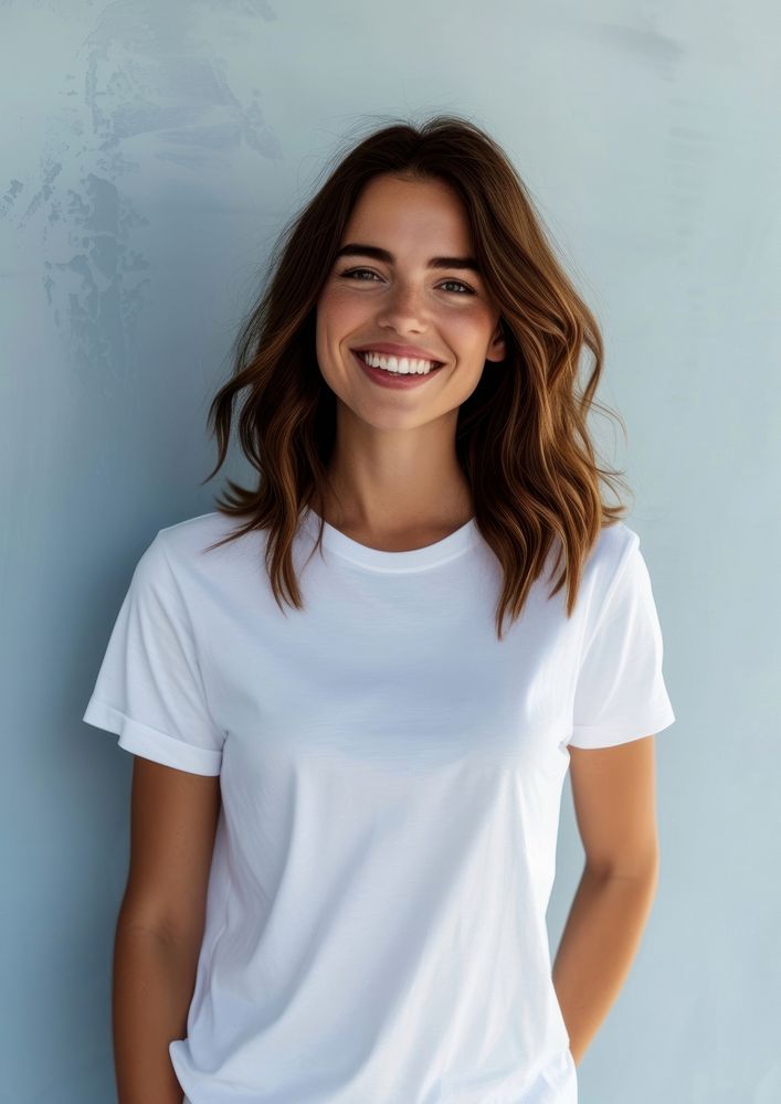 A happy woman wearing white t shirt laughing t-shirt smile.