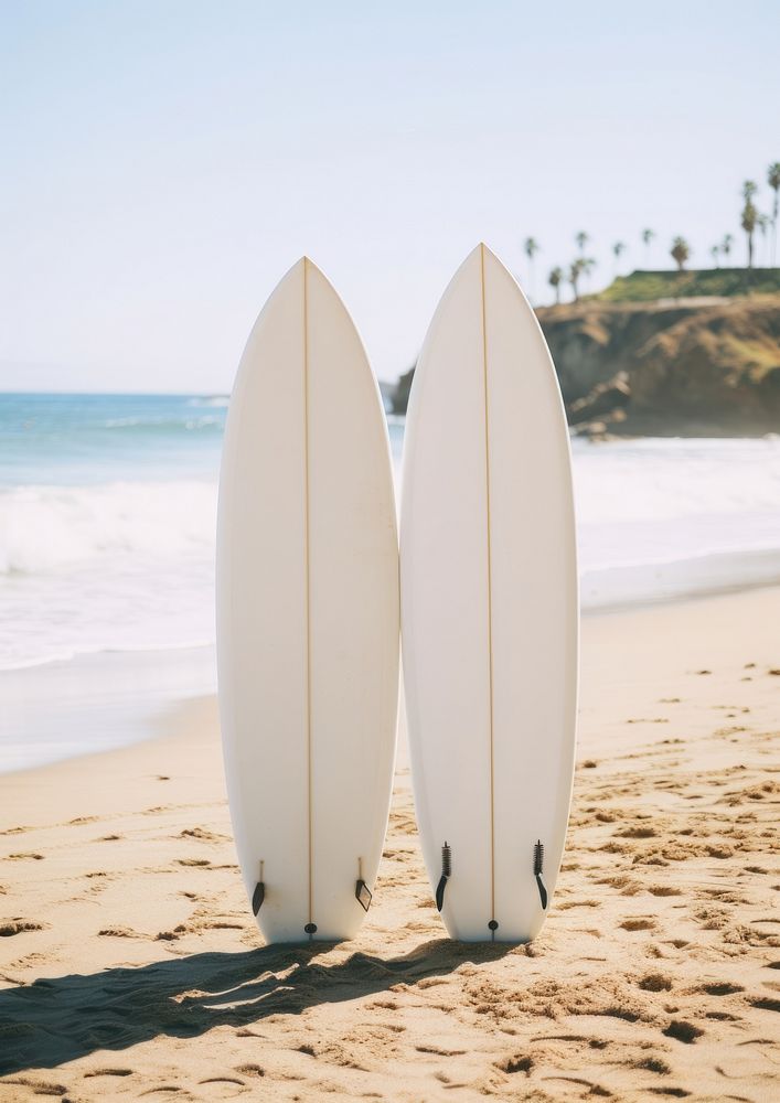 Two white blank surfboard outdoors surfing nature.
