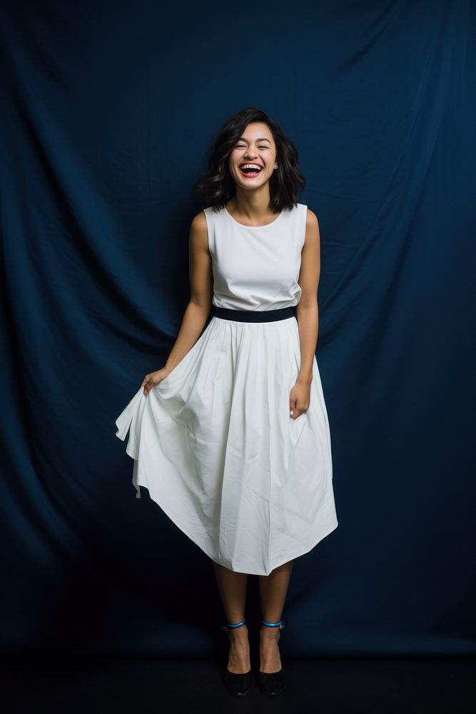A happy woman in a clean white dress portrait adult smile.