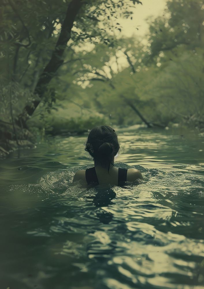 Woman go on an adventure swim surrounded by water outdoors swimming nature.