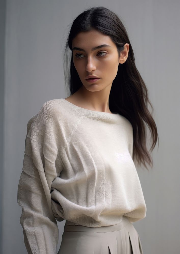 Soft-touch sweater featuring a straight neckline with turn-down detail sleeve portrait adult.