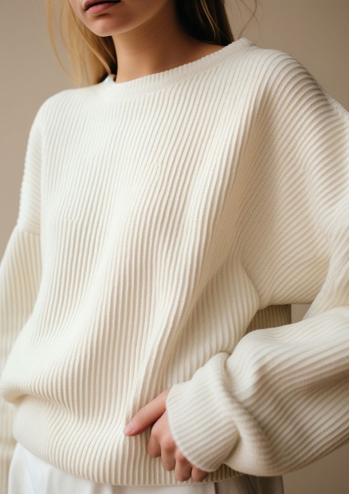 Sweater with long sleeves white outerwear elegance.
