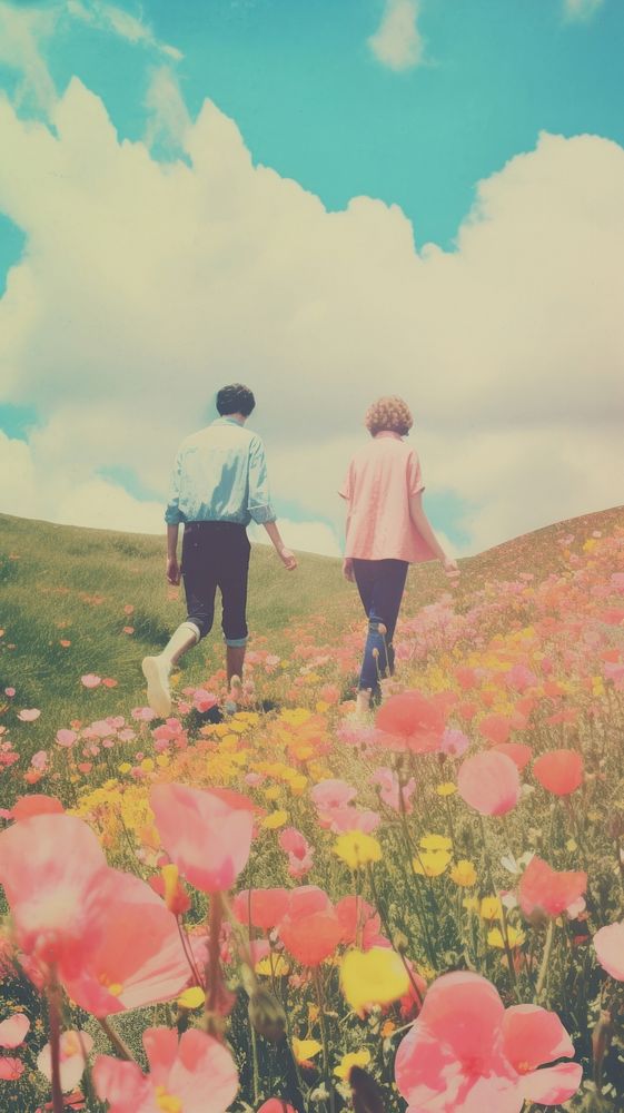Couple walking on the flower meadow landscape outdoors nature.