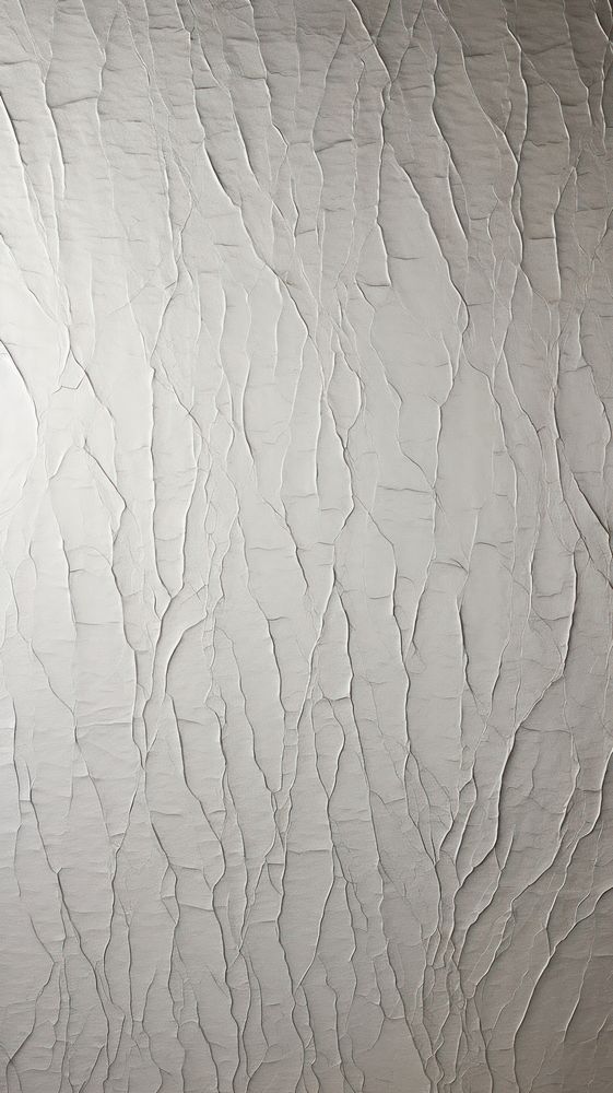 Silver-white wall plaster rough.
