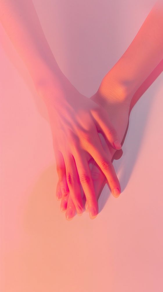 Two hand holding adult pink red.