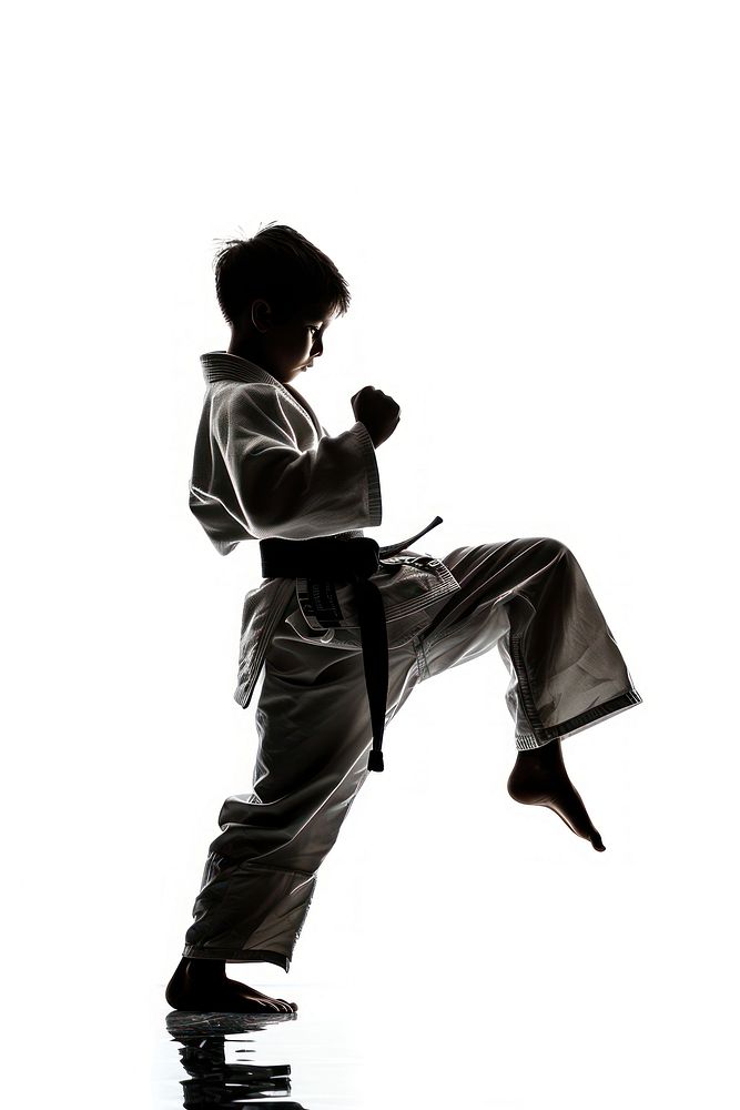 Boy judo fighter high kick silhouette sports karate white.