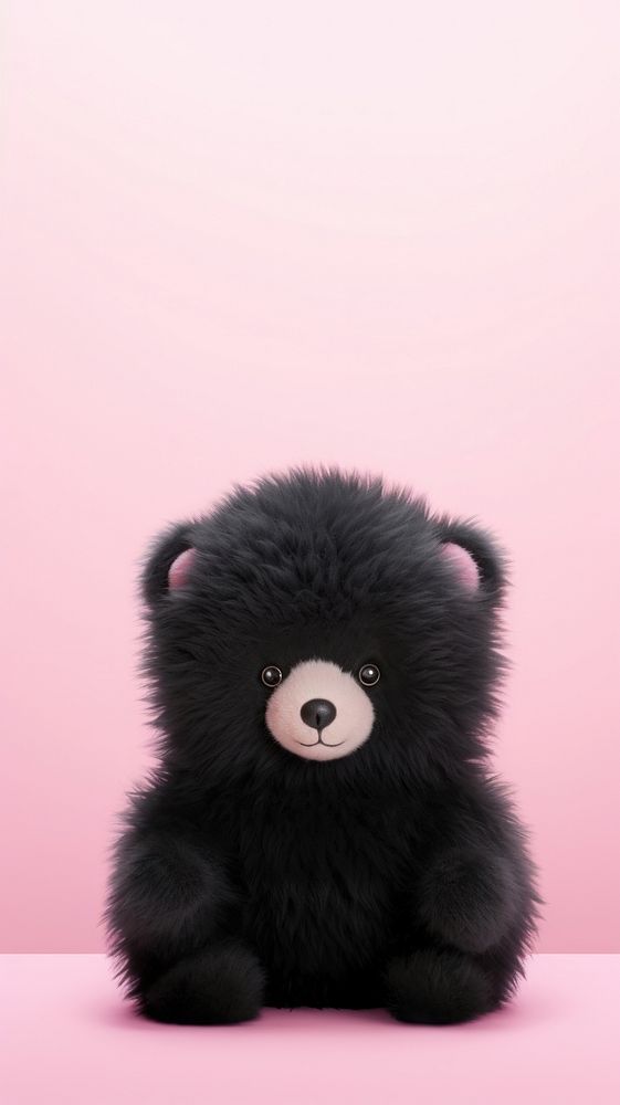Fluffy pastel black bear plush cute toy.