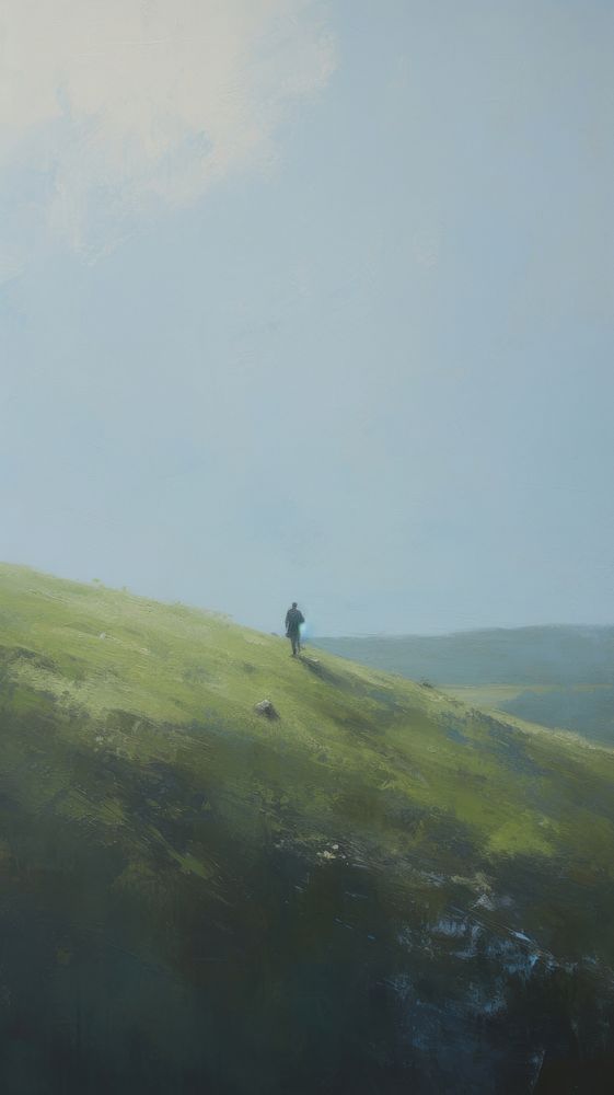Young man on the grass field on the hill in spring painting landscape grassland.