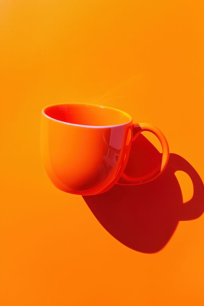 Photo of cup mug refreshment tableware.