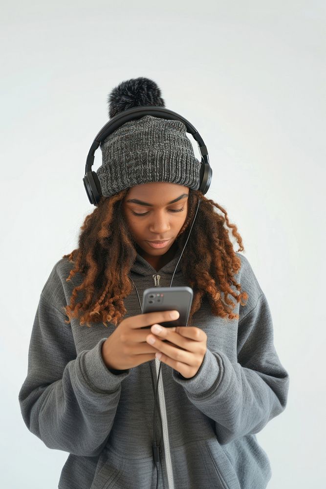 Women using Listen to music with your mobile phone headphones white background portability.