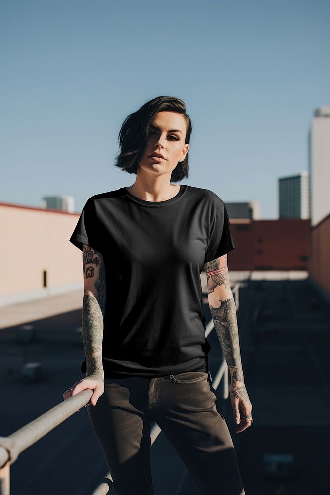 Cool tattooed woman in black t-shirt