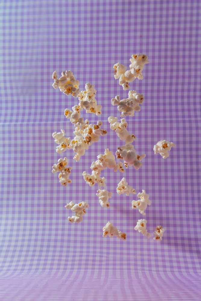 Photo of 5 popcorns backgrounds pattern purple.