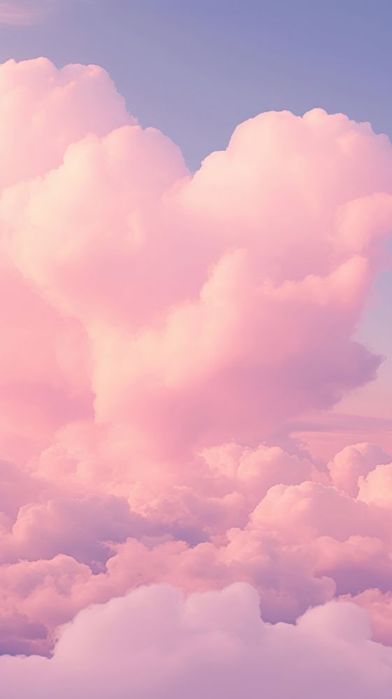 Heart pink clouds in the cute outdoors nature sky.