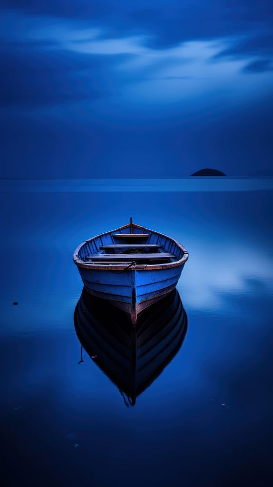 Dark blue backwater topview midnight outdoors vehicle rowboat.