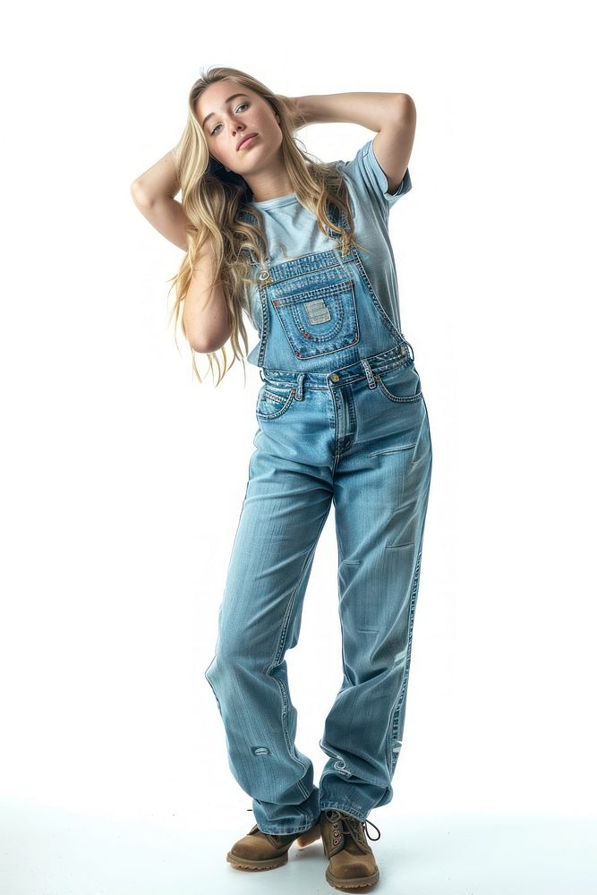 A pretty blonde at a county fair posing in a pair of micro overalls footwear denim jeans.
