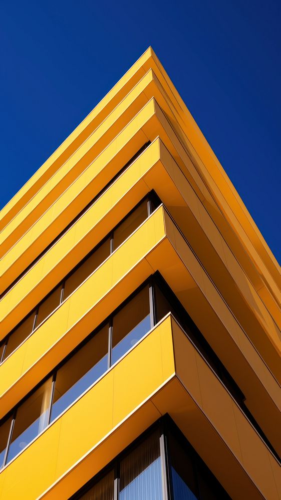 High contrast Empire yellow Building building architecture outdoors.