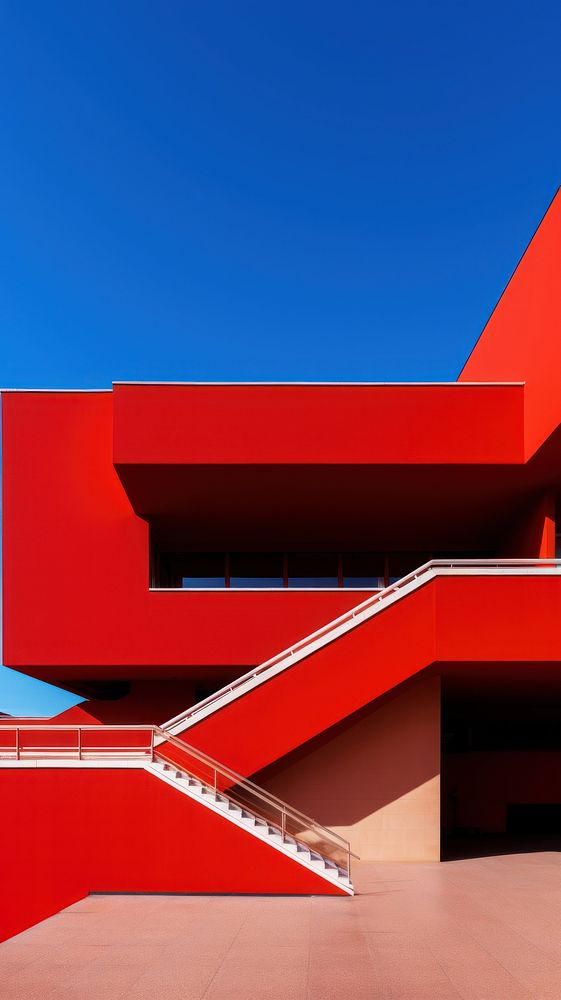 High contrast red building architecture staircase outdoors.