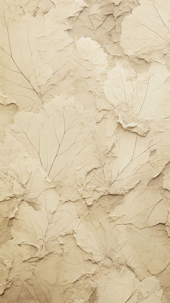 Leaf pattern with some paint on it abstract plaster texture.