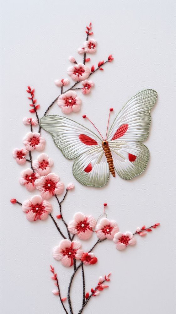 A butterfly with flower in embroidery style plant art accessories.