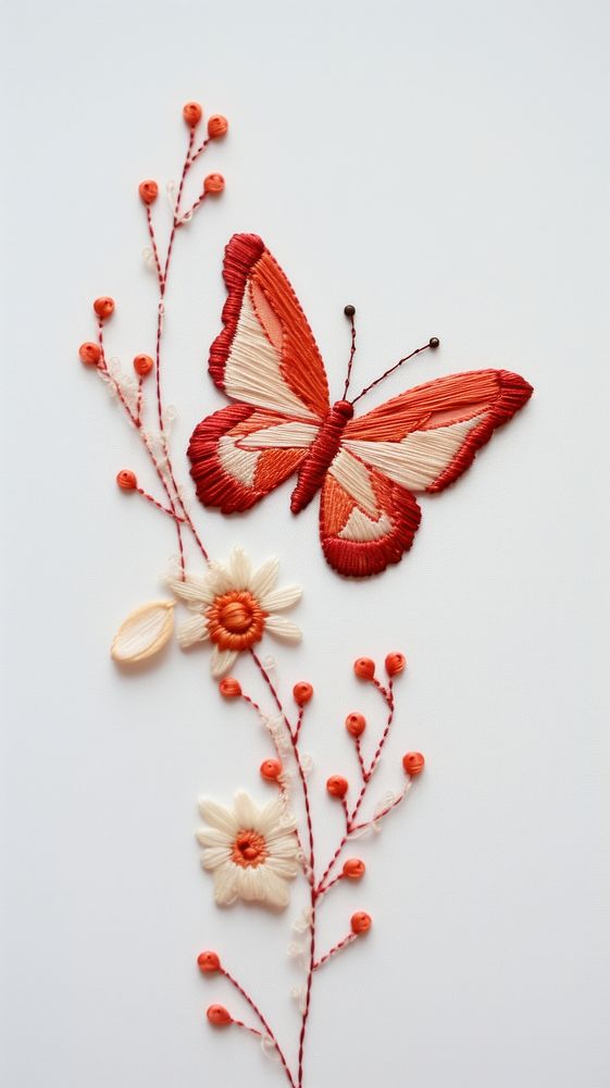 A butterfly with flower in embroidery style pattern art creativity.