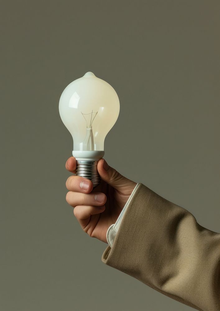 Men holding light bulb lightbulb hand electricity.