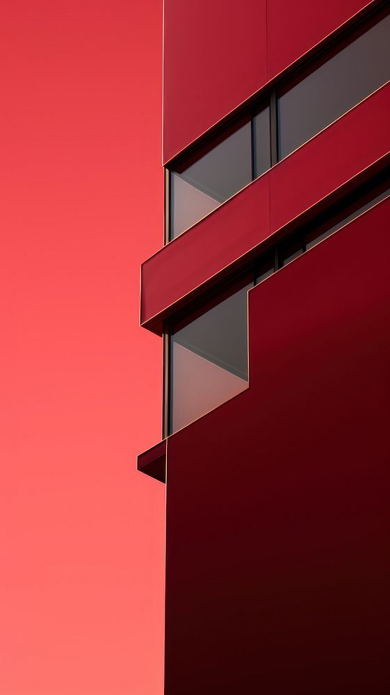 Photography of office building architecture maroon wall.
