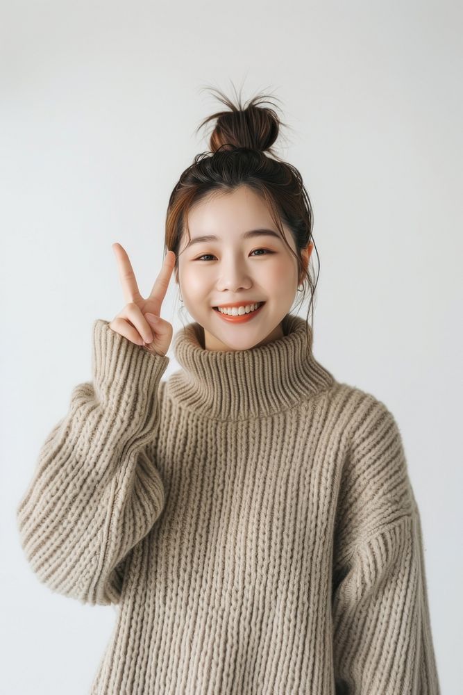 Korean teenager portrait cheerful sweater.