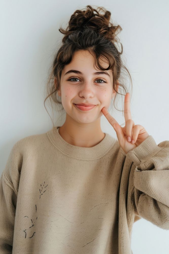 Teenager portrait cheerful sweater.