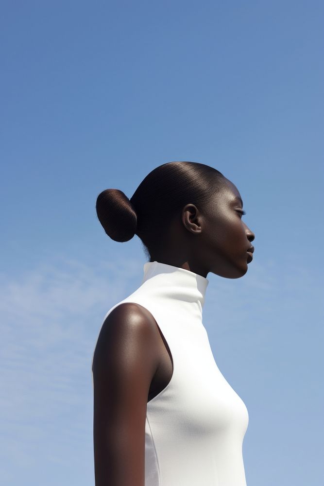 A black teenage woman wearing minimal white dress photography fashion adult.